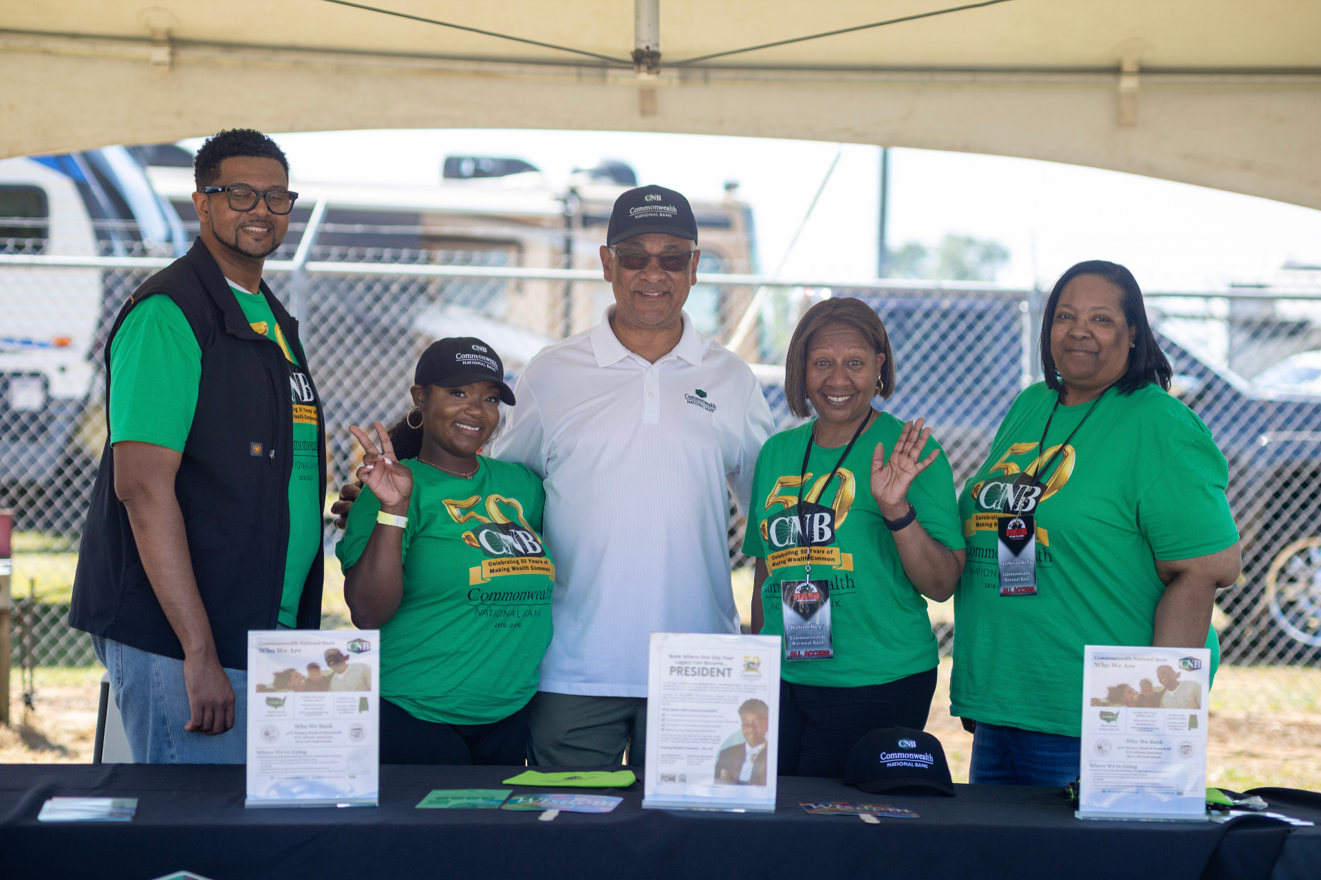 Commonwealth National Bank team at the Spring Fling Music Festival booth